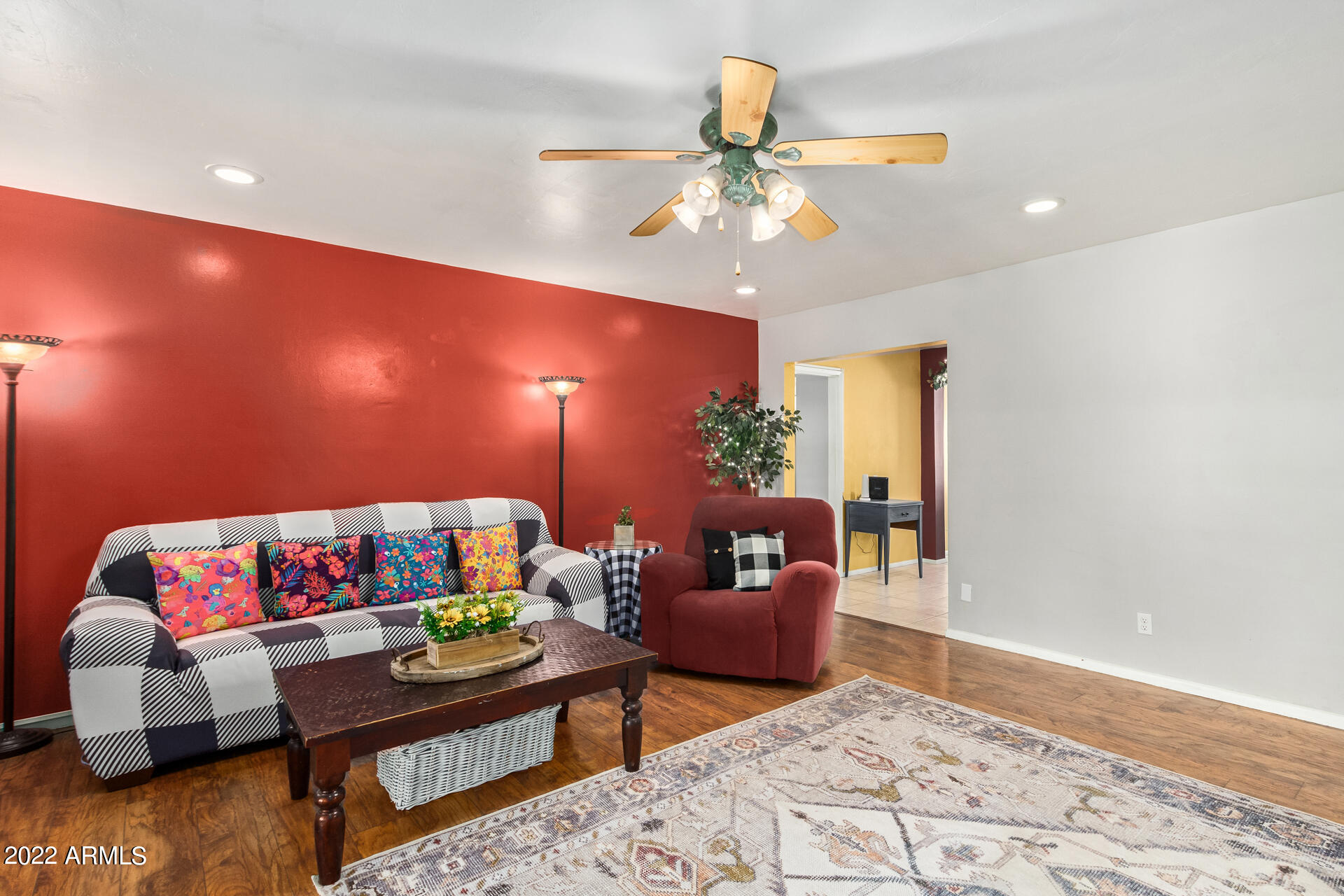 7201 North 16th Drive Phoenix, AZ 85021 - Photo 6 of 29 a living room with furniture and wooden floor