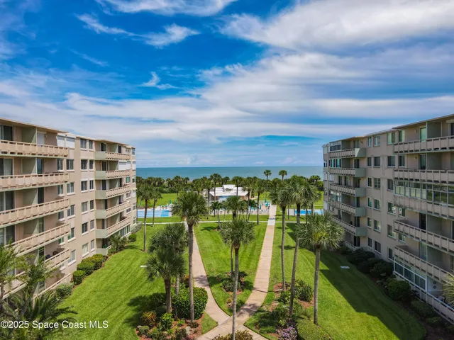 a view of swimming pool with outdoor seating