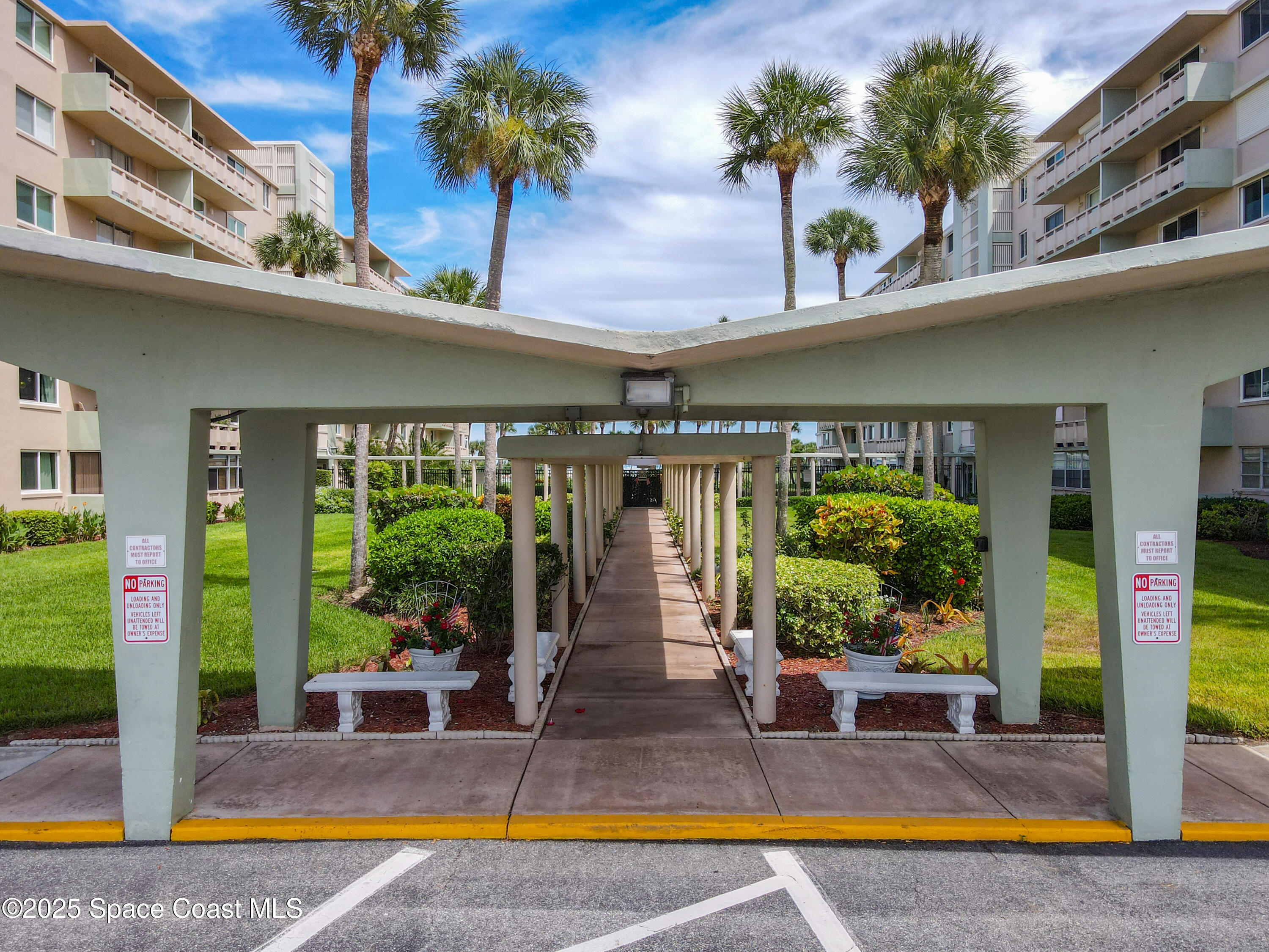 2020 North Atlantic Avenue, Unit 514N Cocoa Beach, FL 32931 - Photo 3 of 31 a view of swimming pool with outdoor seating