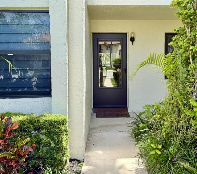 22148 Palms Way, Unit 101 Boca Raton, FL 33433 - Photo 5 of 41 Private front door