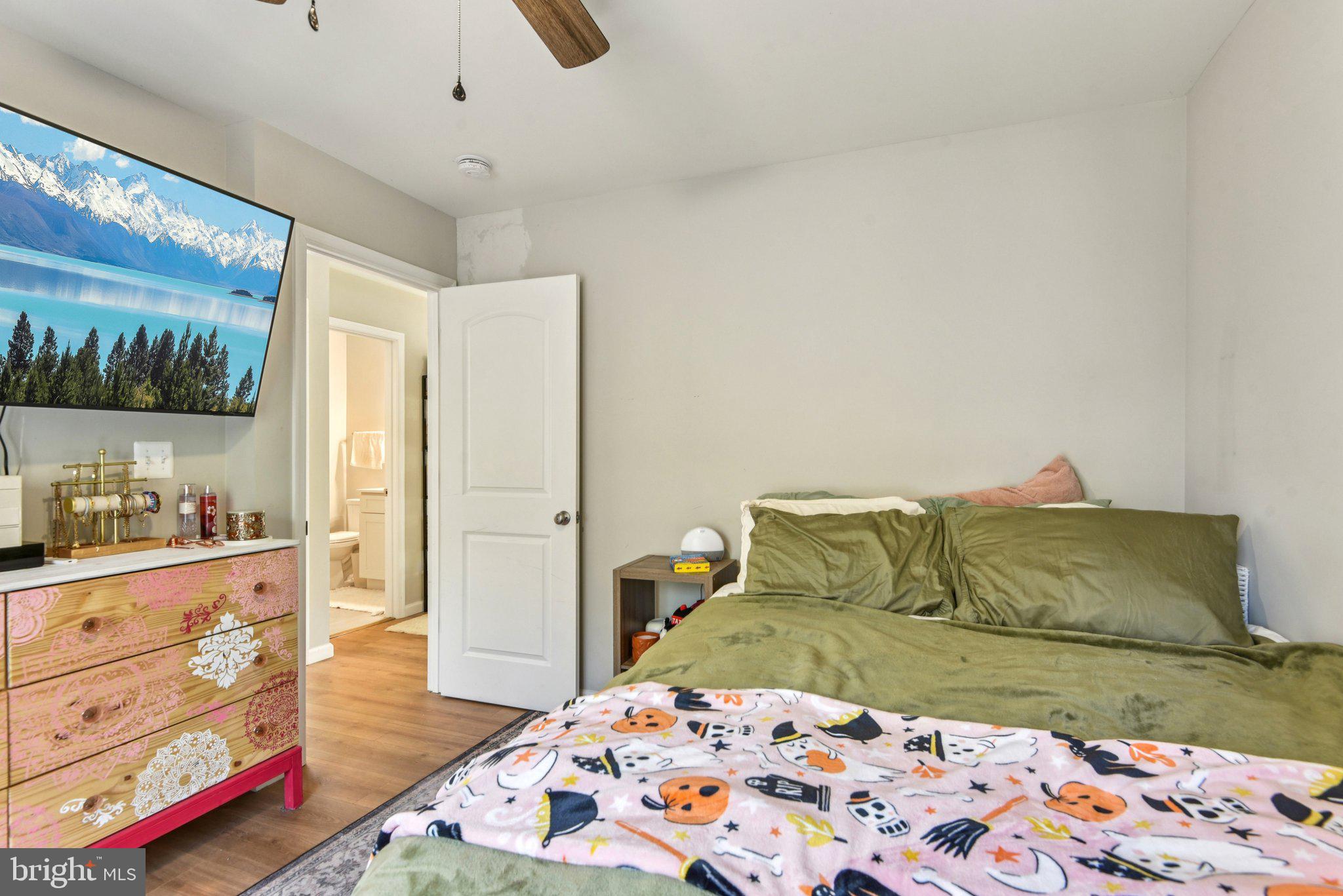 490 Black Twig Road Linden, VA 22642 - Photo 34 of 67 a bedroom with a bed and a dresser in it