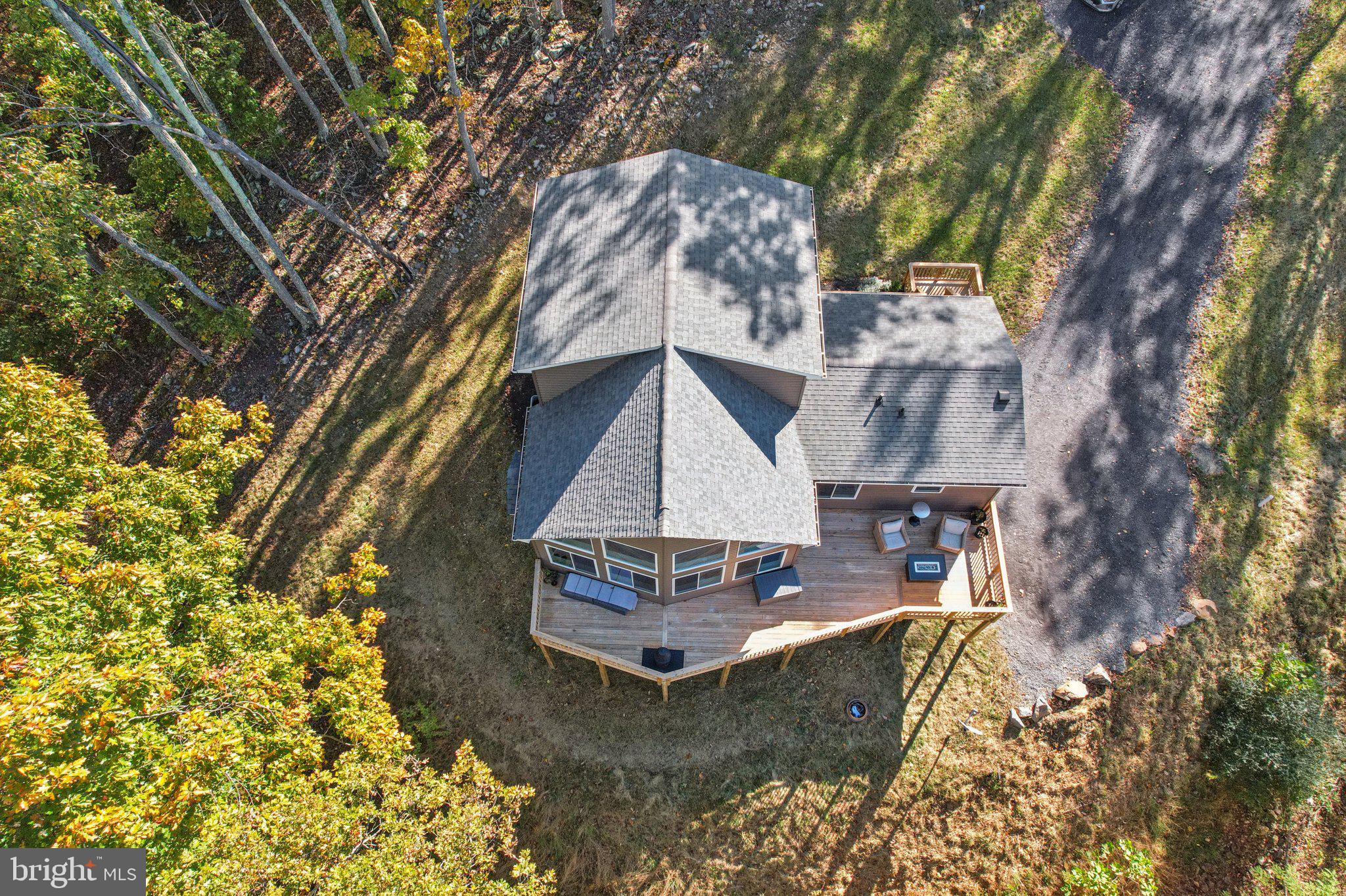 490 Black Twig Road Linden, VA 22642 - Photo 59 of 67 a aerial view of a house with swimming pool and porch