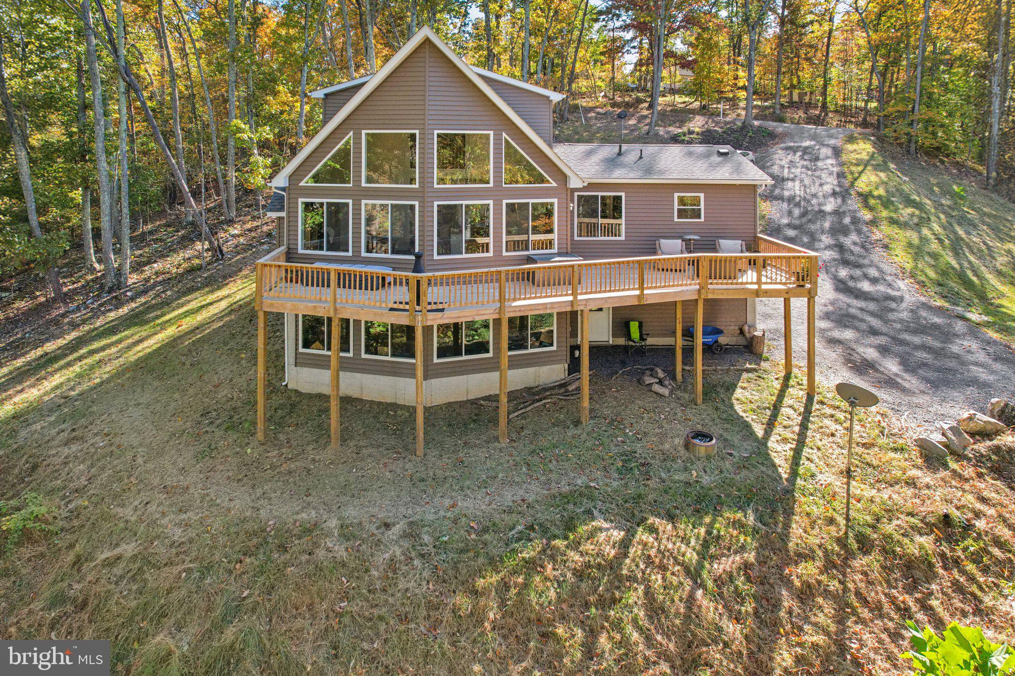 490 Black Twig Road Linden, VA 22642 - Photo 62 of 67 a view of a house with a yard