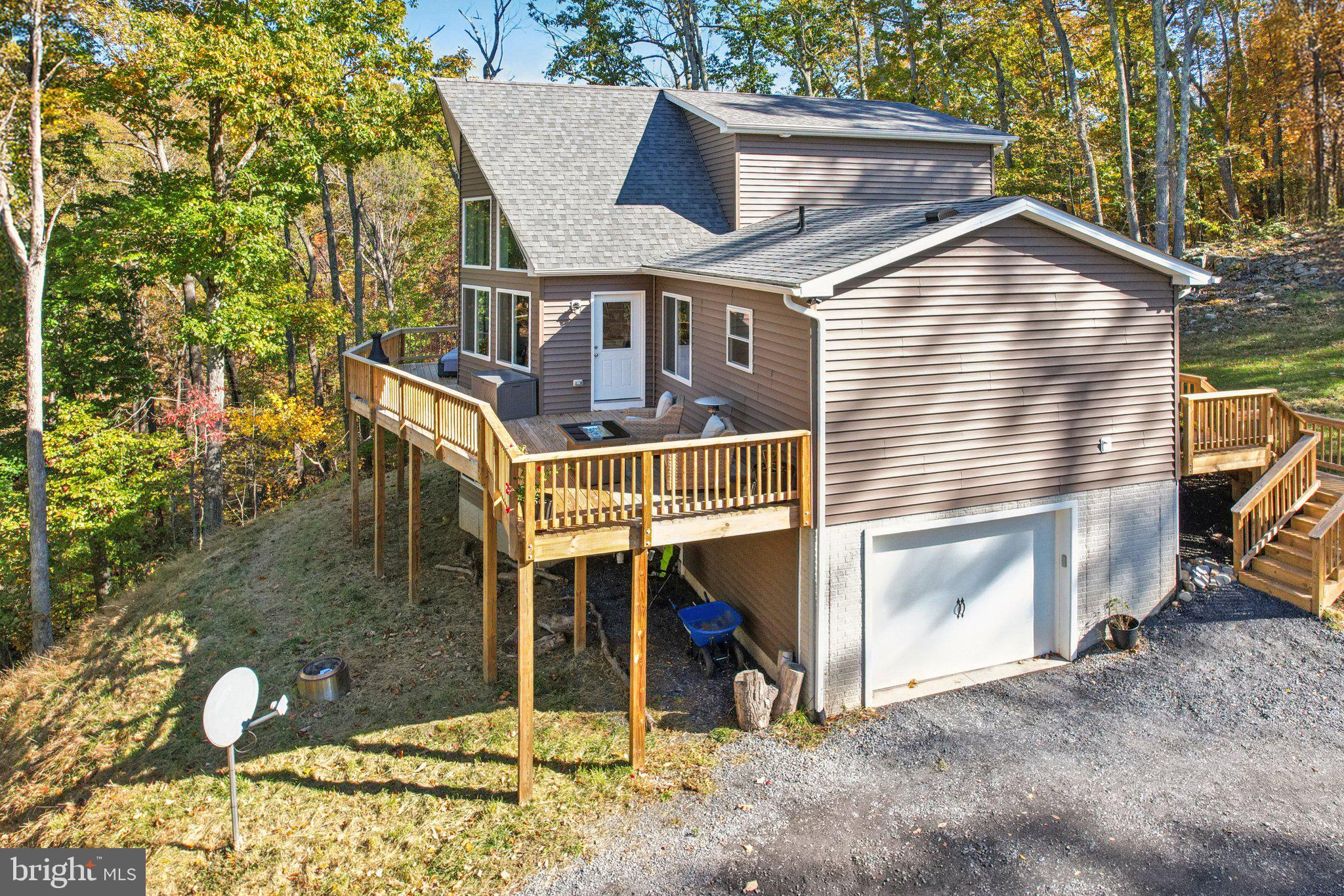 490 Black Twig Road Linden, VA 22642 - Photo 63 of 67 a view of a house with a yard