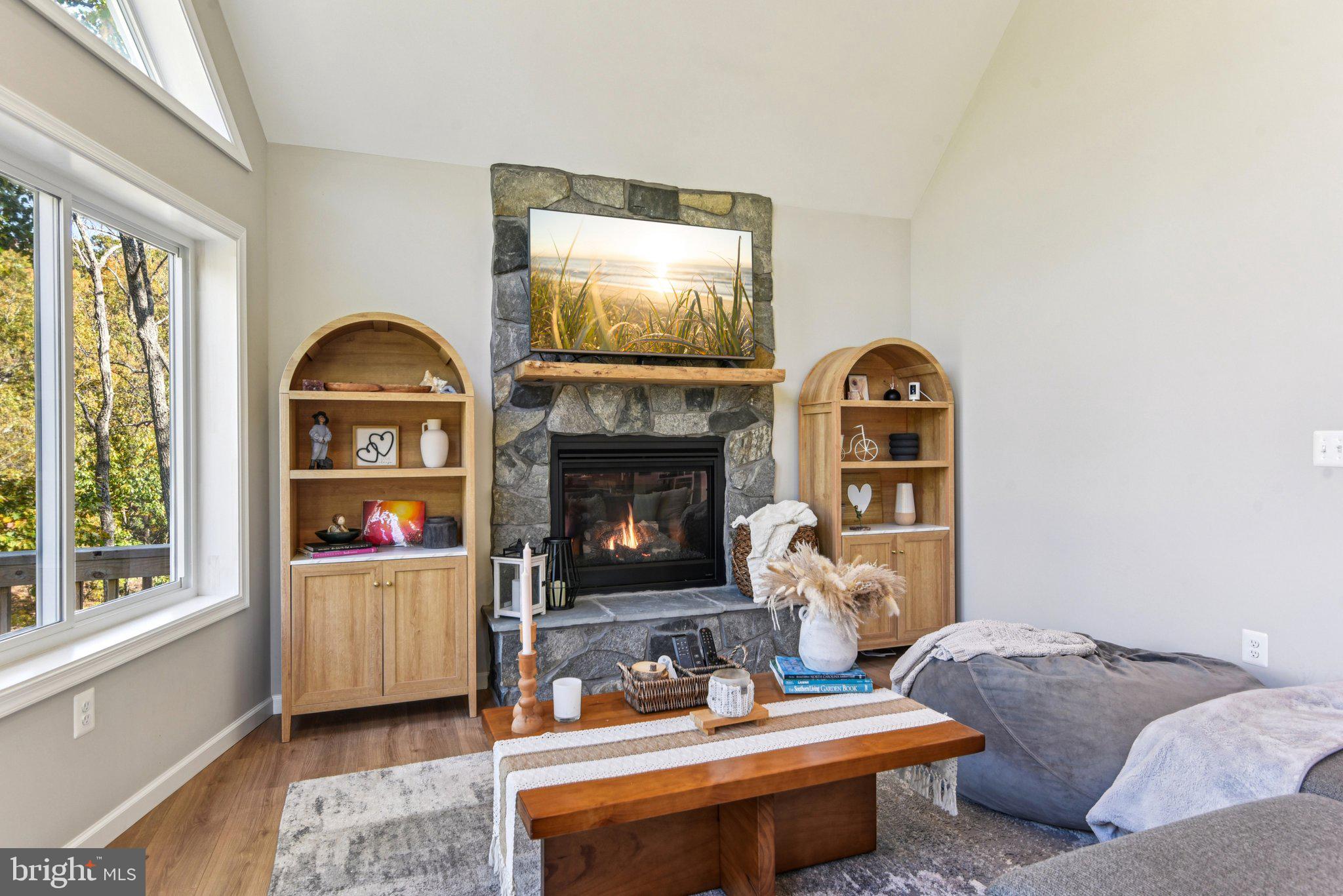 490 Black Twig Road Linden, VA 22642 - Photo 10 of 67 a living room with furniture and a fireplace