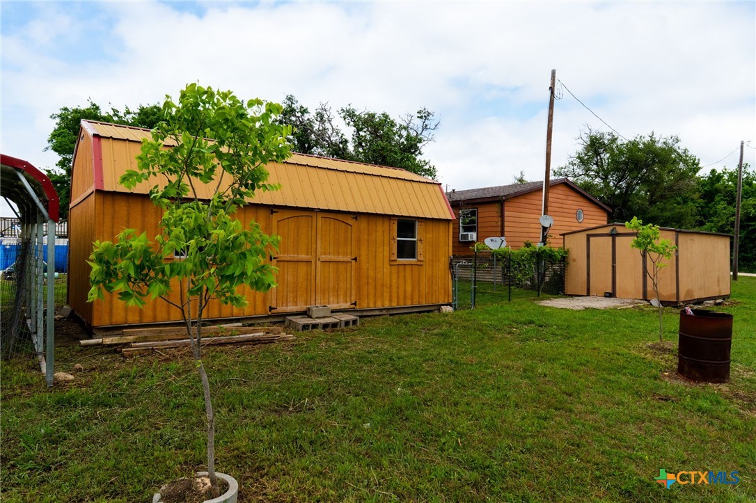 164 County Road 4450 Kempner, TX 76539 - Photo 31 of 44 a backyard of a house with lots of green space