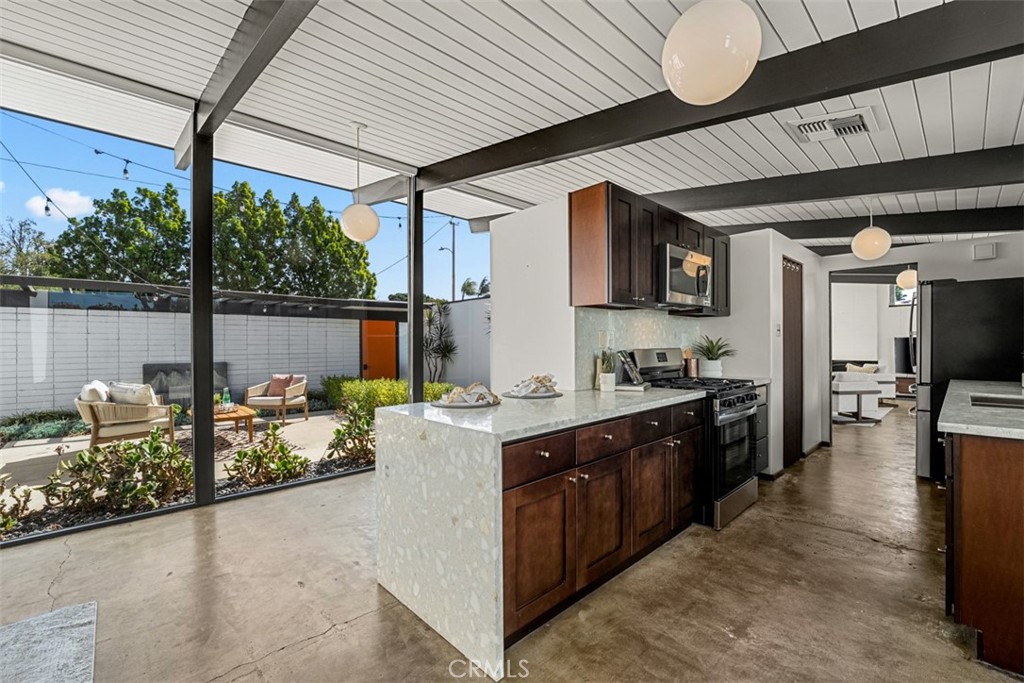 1830 North Ridgewood Street Orange, CA 92865 - Photo 15 of 29 a kitchen with lots of counter top space