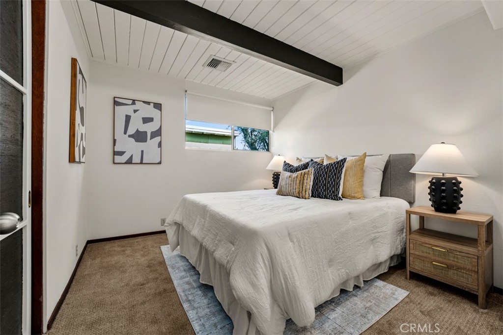 1830 North Ridgewood Street Orange, CA 92865 - Photo 24 of 29 a bedroom with bed and painting on the wall