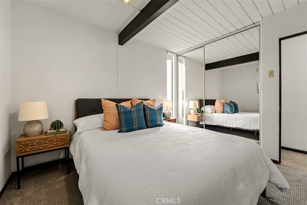 1830 North Ridgewood Street Orange, CA 92865 - Photo 25 of 29 a bedroom with a bed and a lamp