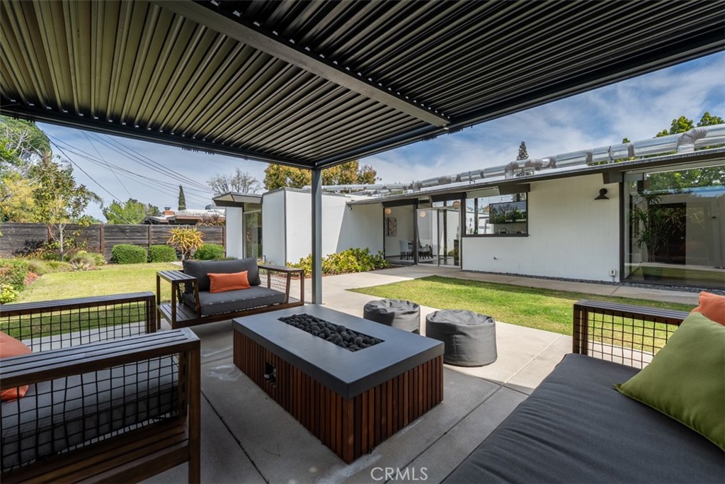 1830 North Ridgewood Street Orange, CA 92865 - Photo 27 of 29 a view of a swimming pool with a patio