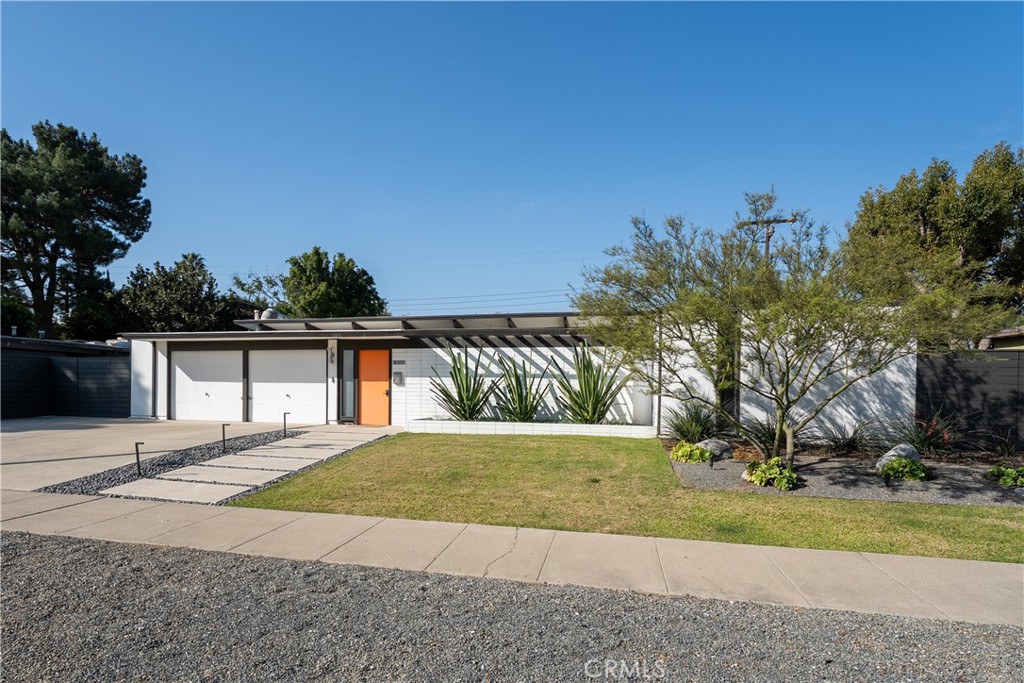 1830 North Ridgewood Street Orange, CA 92865 - Photo 3 of 29 a view of a house with a yard