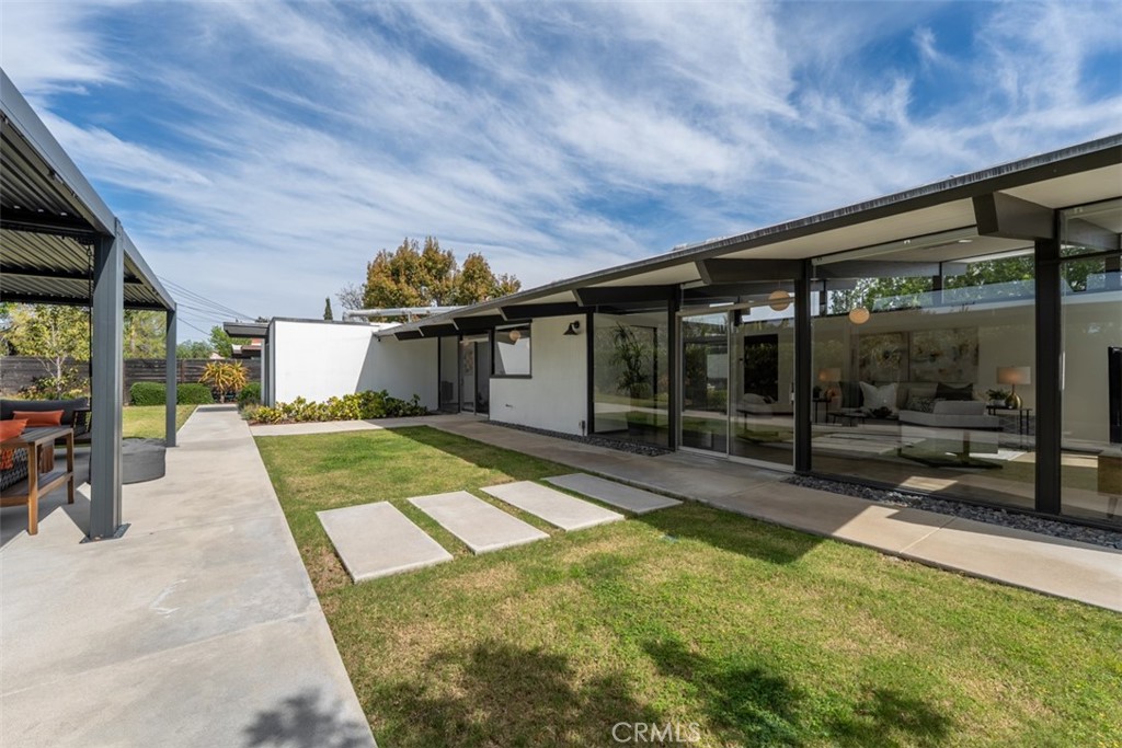 1830 North Ridgewood Street Orange, CA 92865 - Photo 7 of 29 a view of a house with backyard and porch