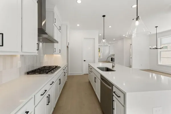 an empty room with a ceiling fan and a window