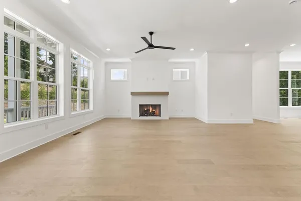 a kitchen with stainless steel appliances granite countertop a sink and a stove
