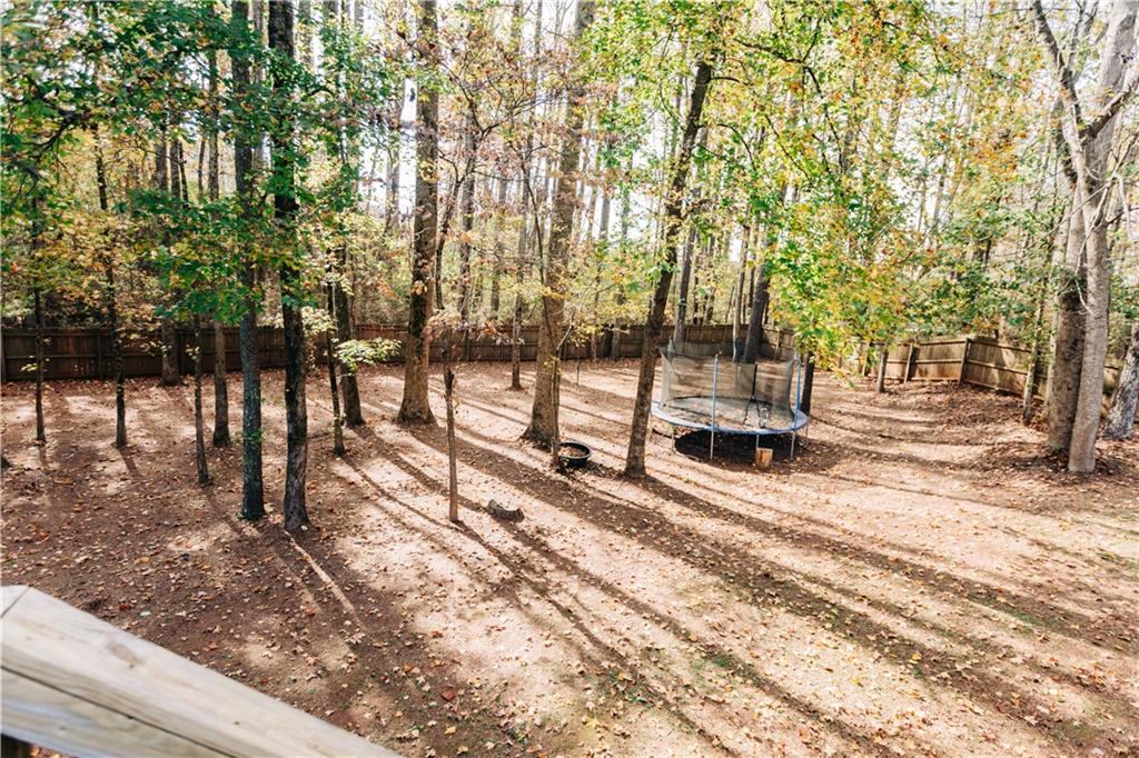 2533 Gold Hill Court Villa Rica, GA 30180 - Photo 16 of 46 a view of a park with bench and trees