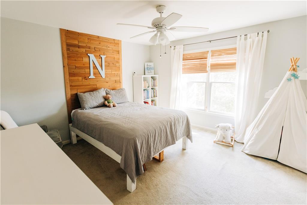 2533 Gold Hill Court Villa Rica, GA 30180 - Photo 33 of 46 a bedroom with a bed and a window