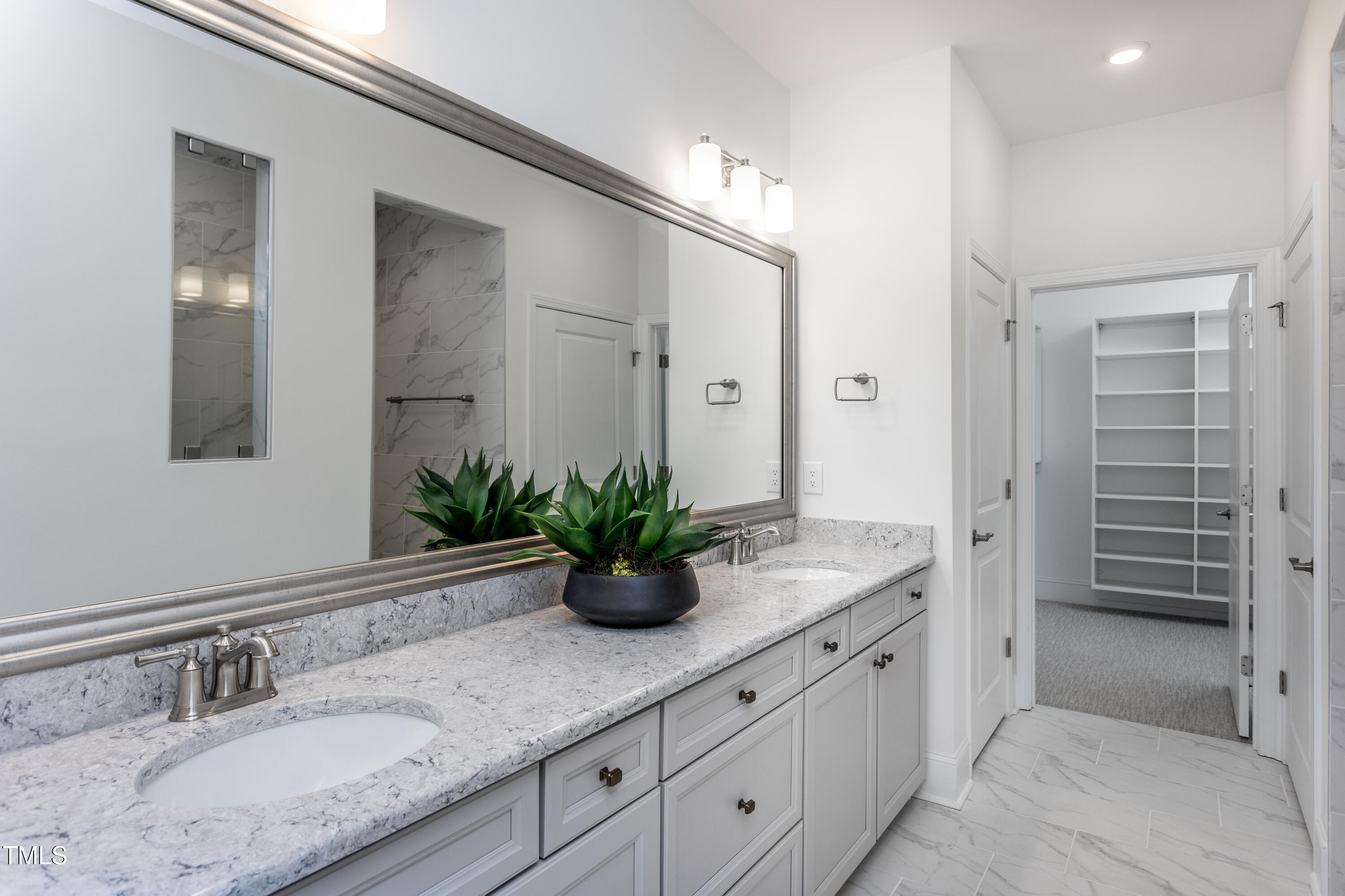294 Arcadius Drive Clayton, NC 27520 - Photo 13 of 18 a bathroom with a granite countertop sink and a mirror