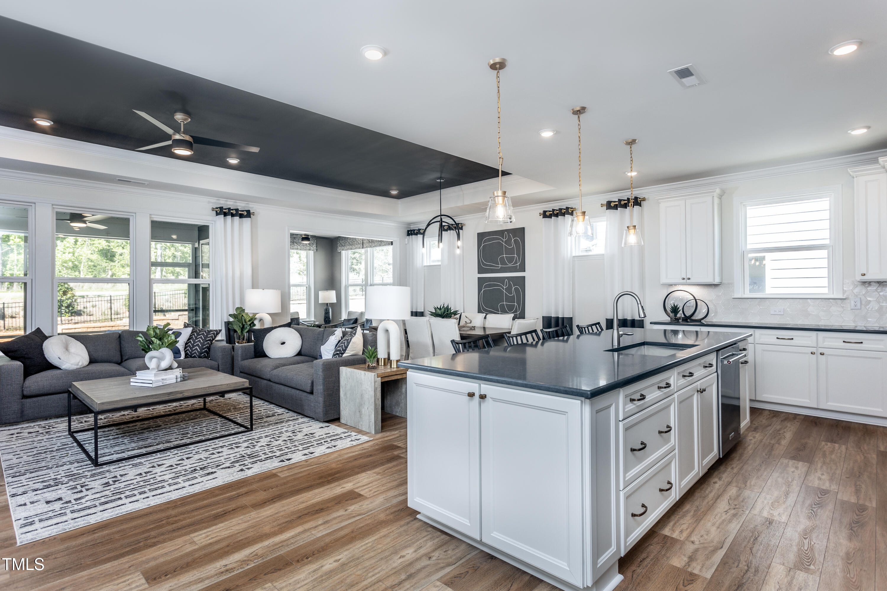 294 Arcadius Drive Clayton, NC 27520 - Photo 2 of 18 a large white kitchen with a large window