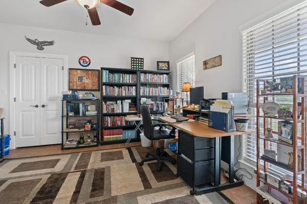a view of a workspace with furniture
