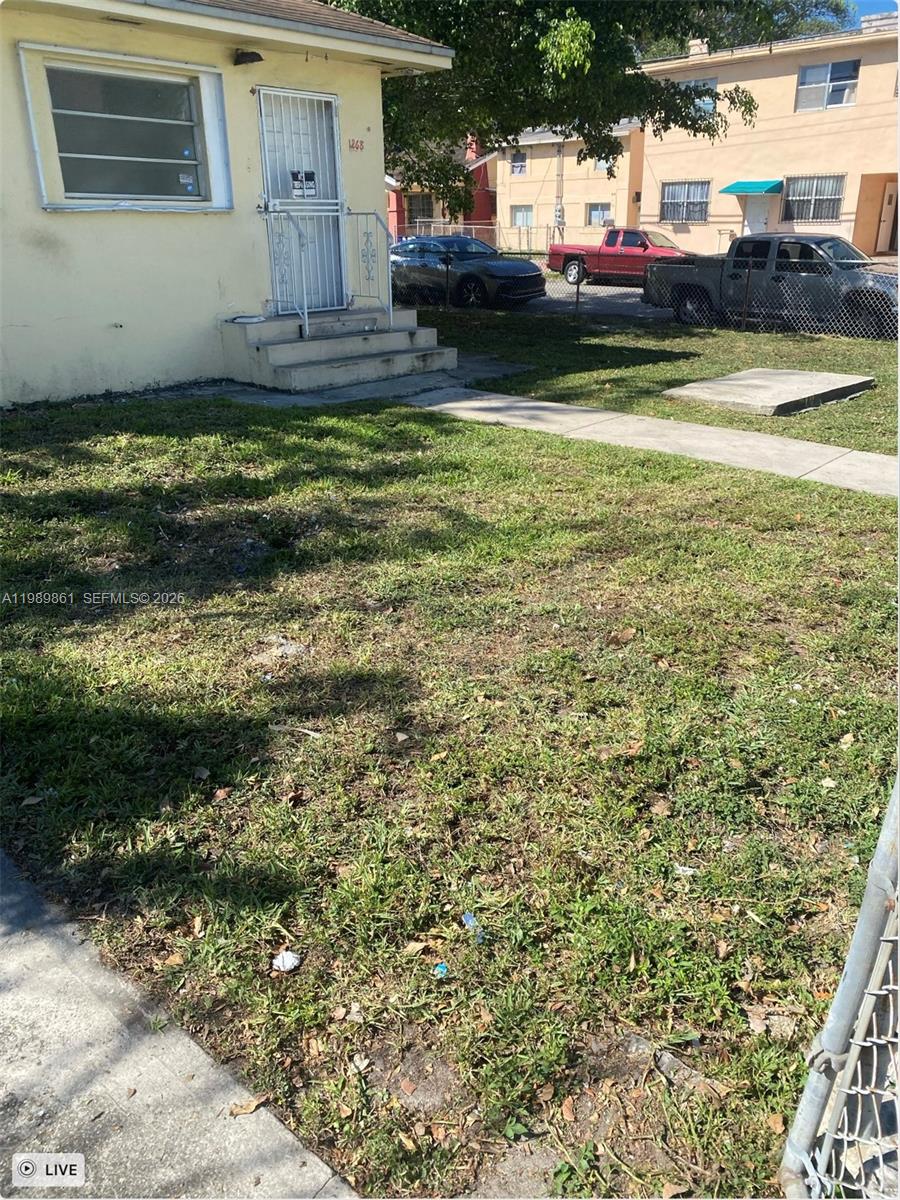 1268 Southwest 4th Street Miami, FL 33135 - Photo 3 of 7 a view of a house with a yard