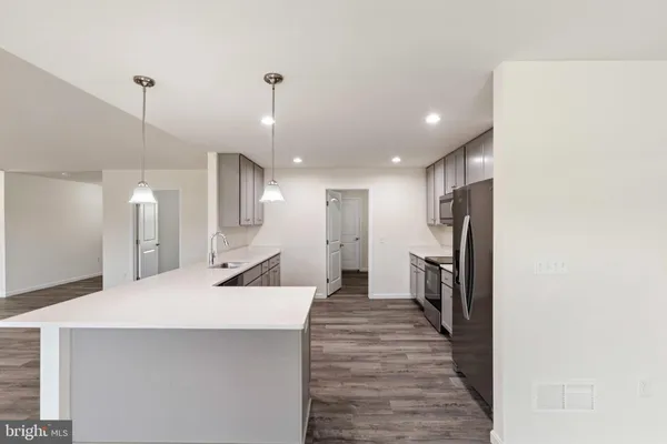 a large kitchen with a lot of counter space