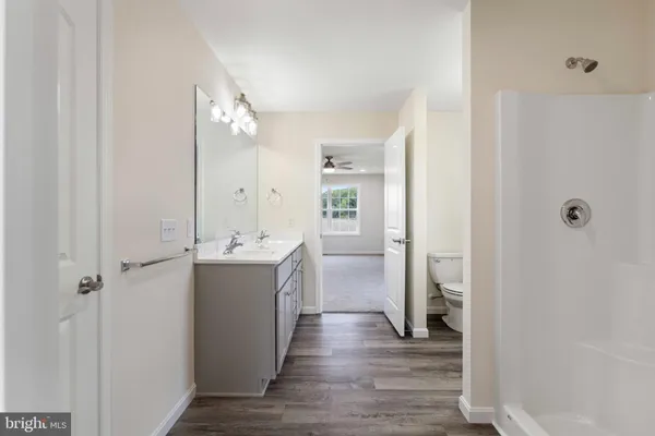 a view of a kitchen from the hallway