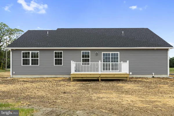 a front view of a house with swimming pool