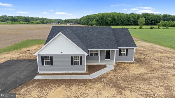 a house with river in front of it