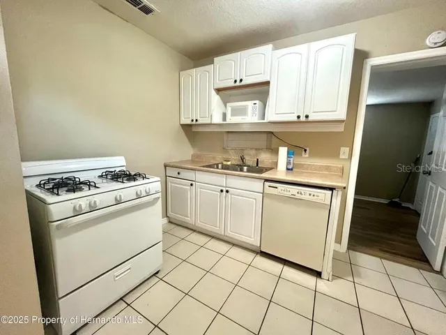 $1,575 | 1032 Marlow Avenue, Spring Hill, FL 34606