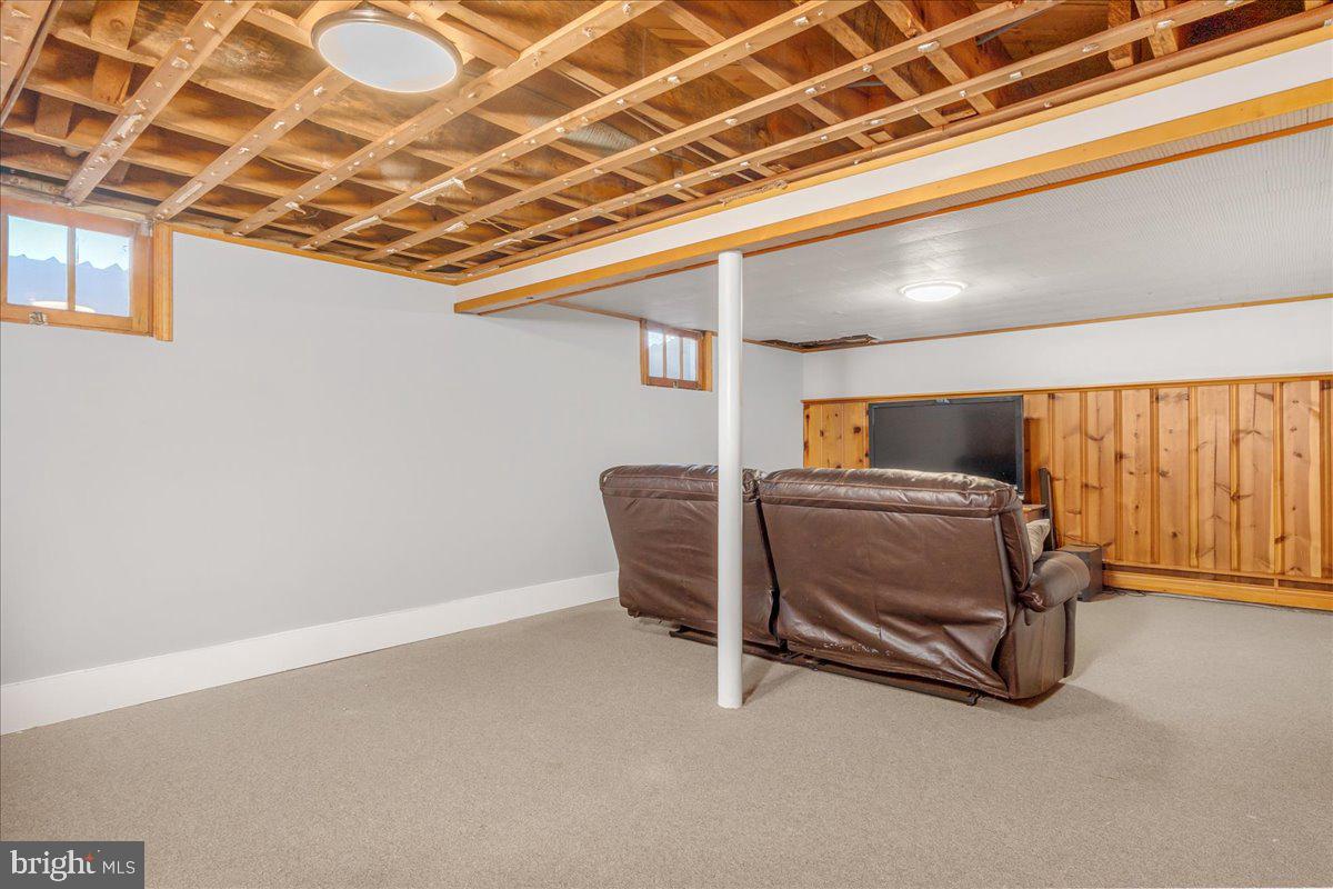 8466 Greenway Road Pasadena, MD 21122 - Photo 27 of 56 a view of a room with wooden floor