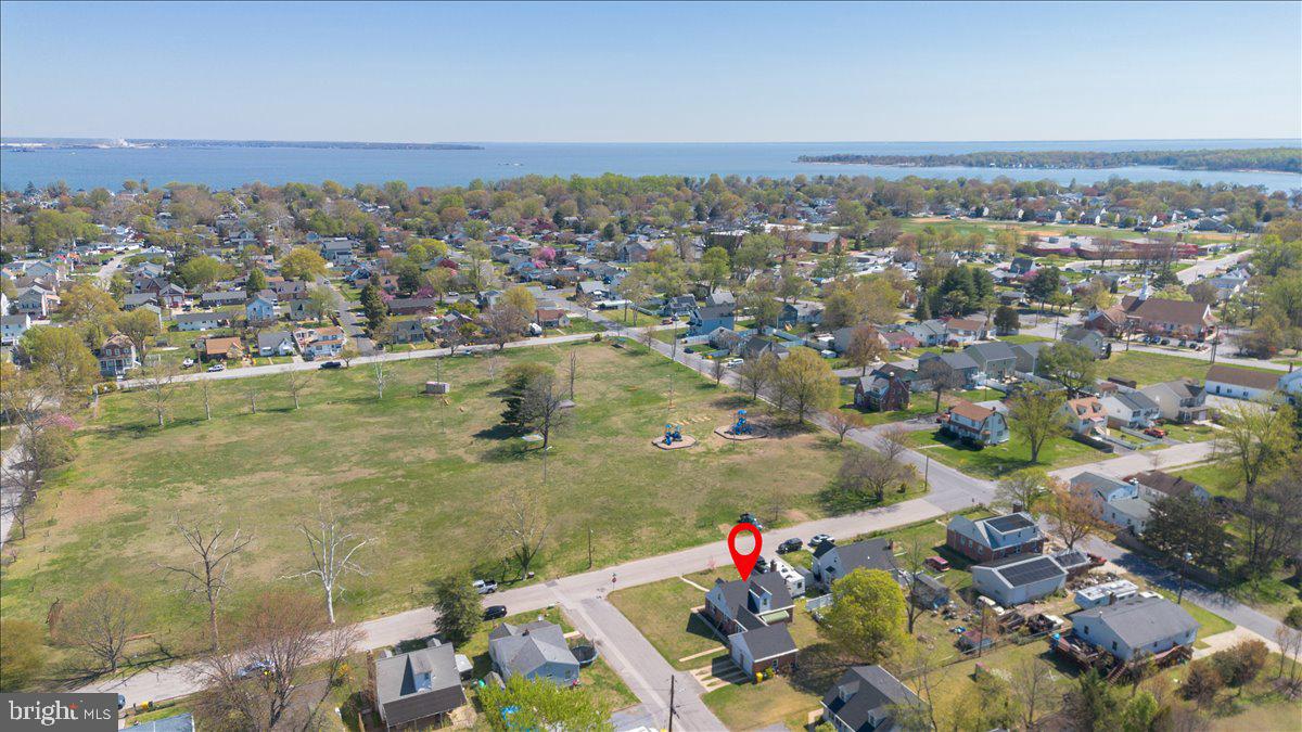 8466 Greenway Road Pasadena, MD 21122 - Photo 51 of 56 an aerial view of residential houses with outdoor space