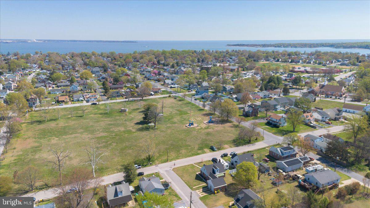 8466 Greenway Road Pasadena, MD 21122 - Photo 52 of 56 an aerial view of residential houses with outdoor space