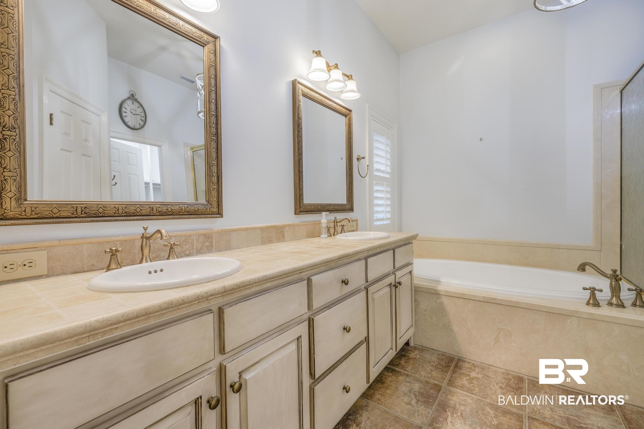 13612 Rue Royal Lane Silverhill, AL 36576 - Photo 24 of 65 Full bathroom with a bath, double vanity, and tile patterned flooring