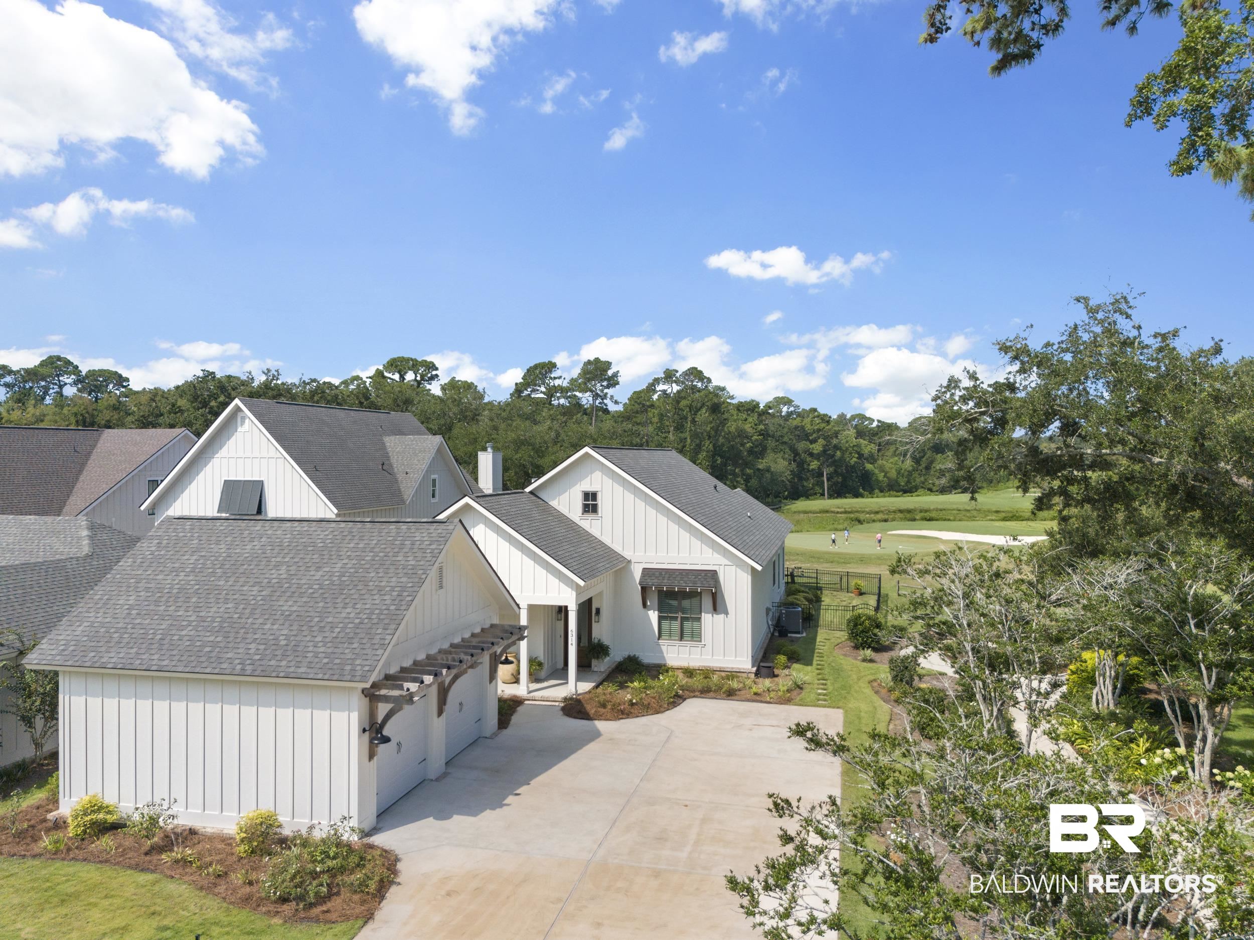 6314 Battles Road Fairhope, AL 36532 - Photo 22 of 27 Exterior space with a front yard and a garage