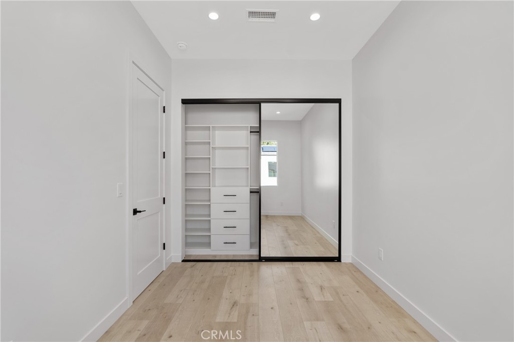 17313 Los Alimos Street, Unit 1/2 Granada Hills, CA 91344 - Photo 5 of 6 a view of wooden floor