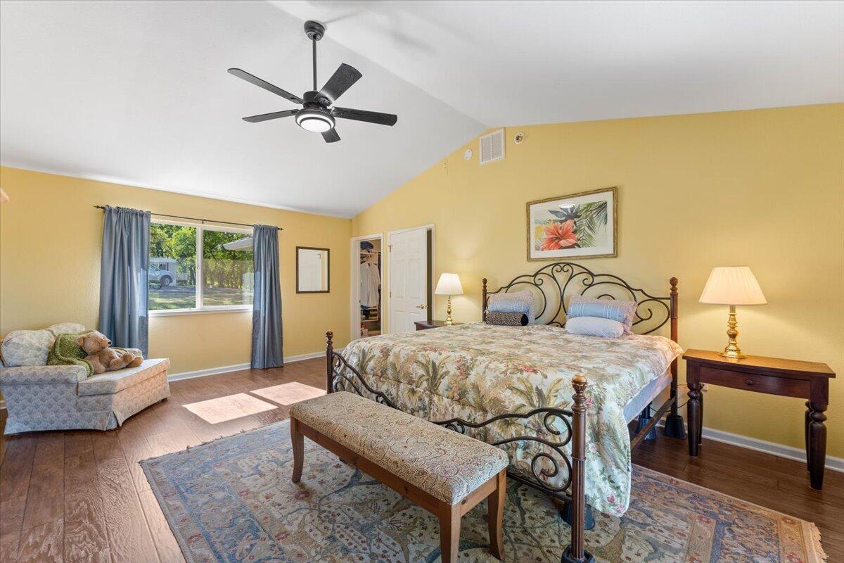 20410 Mallorca Lane Red Bluff, CA 96080 - Photo 13 of 37 a bedroom with a bed and a couch