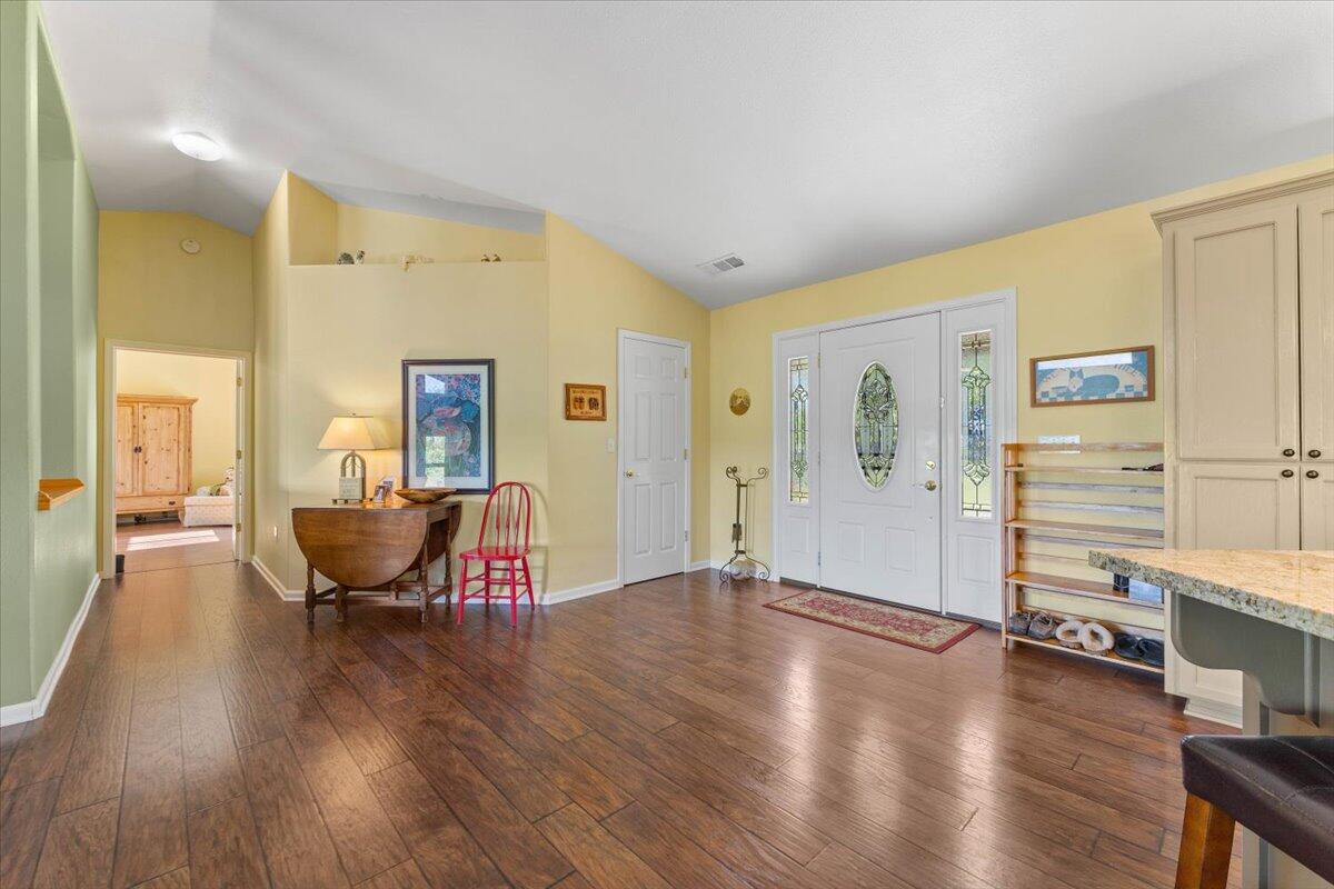 20410 Mallorca Lane Red Bluff, CA 96080 - Photo 2 of 37 a view of a livingroom with furniture and wooden floor