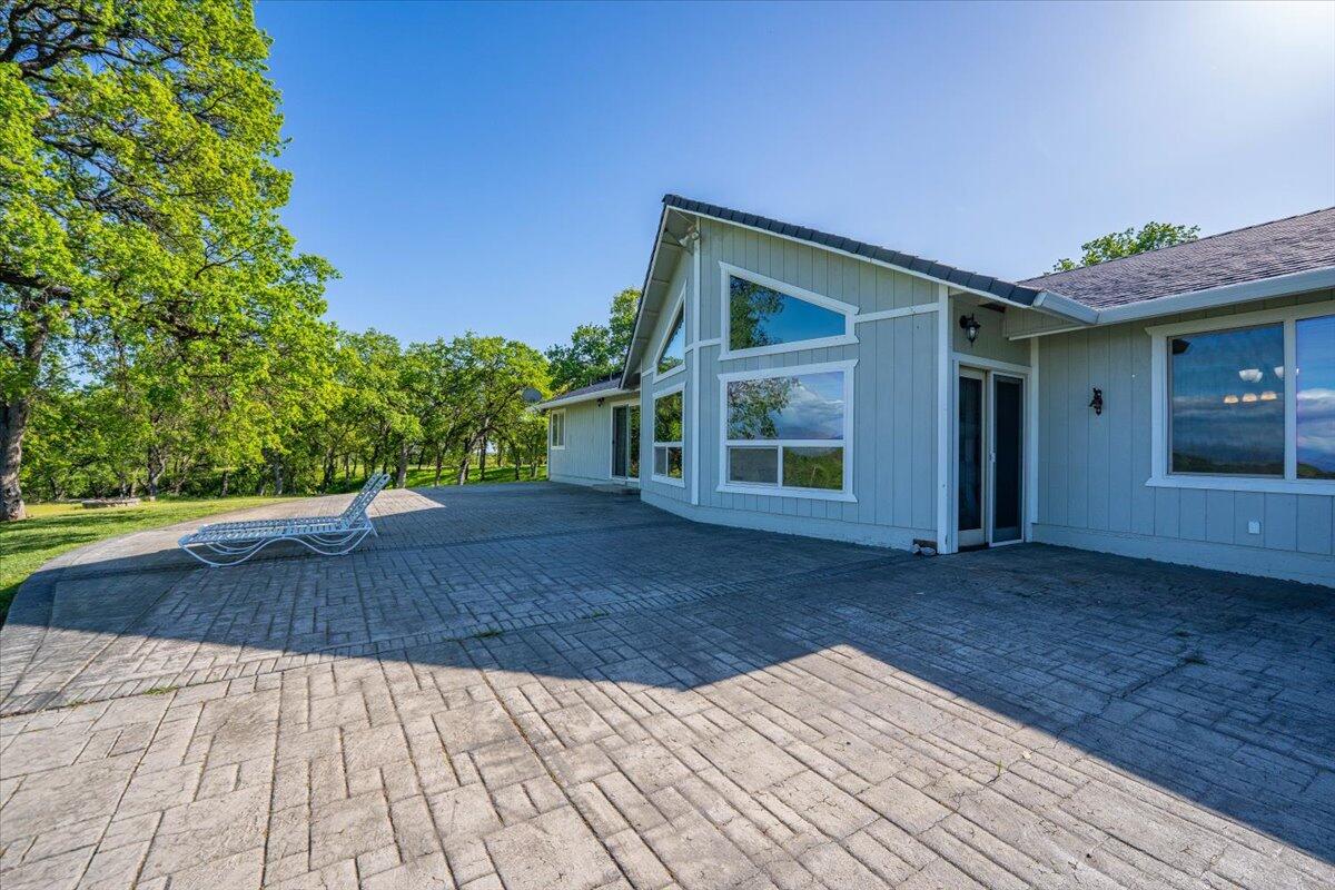 20410 Mallorca Lane Red Bluff, CA 96080 - Photo 25 of 37 a view of backyard with large tree