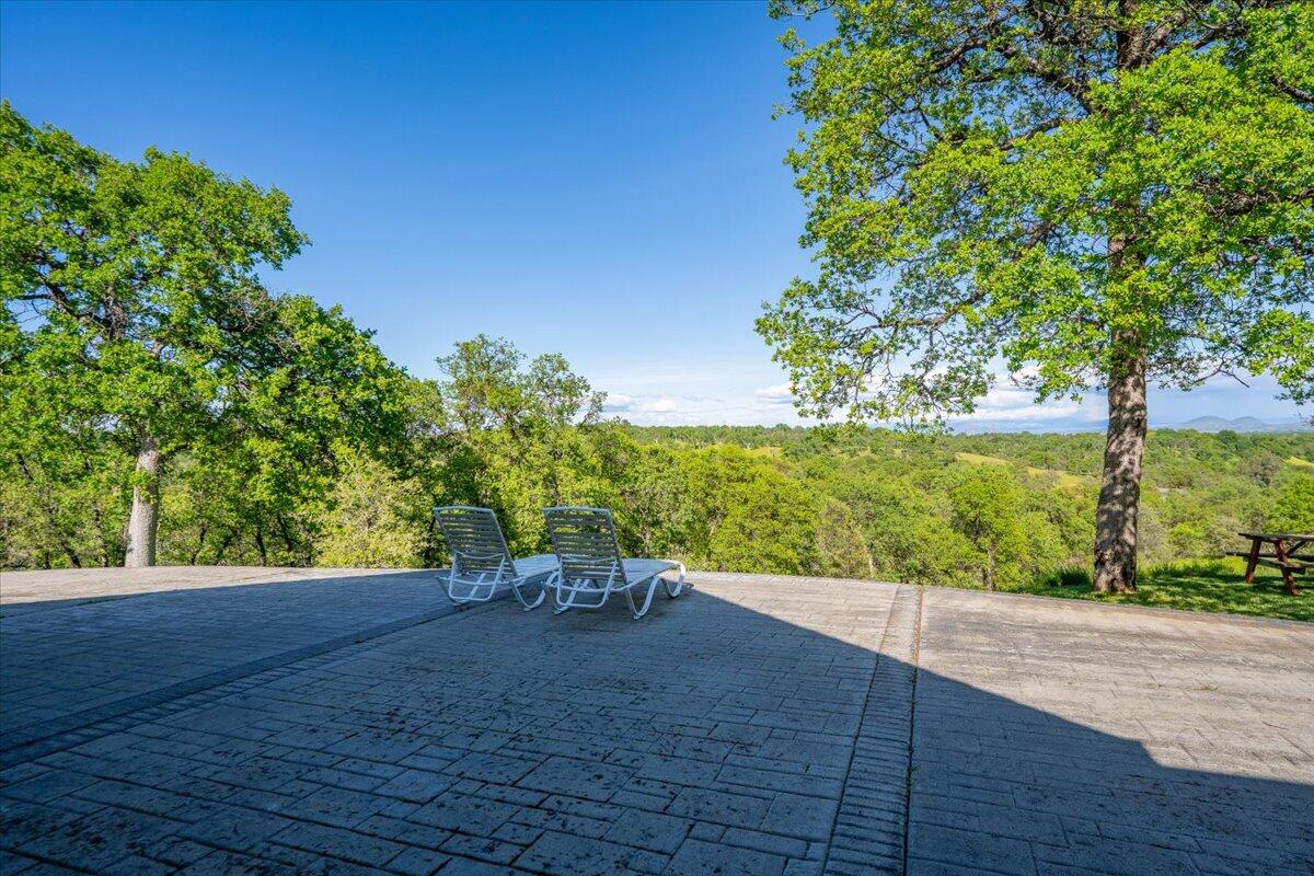 20410 Mallorca Lane Red Bluff, CA 96080 - Photo 29 of 37 a view of a yard with an outdoor space