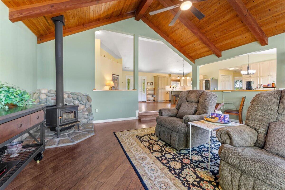 20410 Mallorca Lane Red Bluff, CA 96080 - Photo 6 of 37 a living room with furniture and a wooden floor