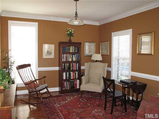 1152 Harp Street Raleigh, NC 27604 - Photo 3 of 11 a view of a livingroom with furniture window and wooden floor