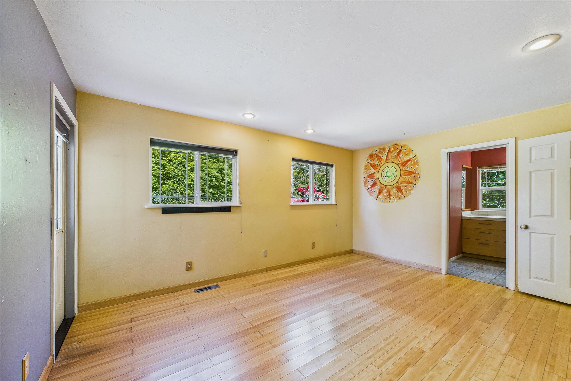1945 Grange Road McKinleyville, CA 95519 - Photo 35 of 62 a view of an empty room with wooden floor and a window