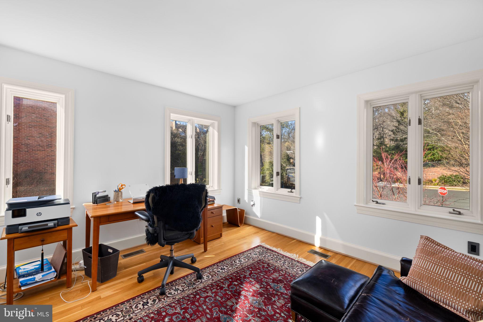 3988 Georgetown Court Northwest Washington, DC 20007 - Photo 19 of 38 a living room with furniture and a window