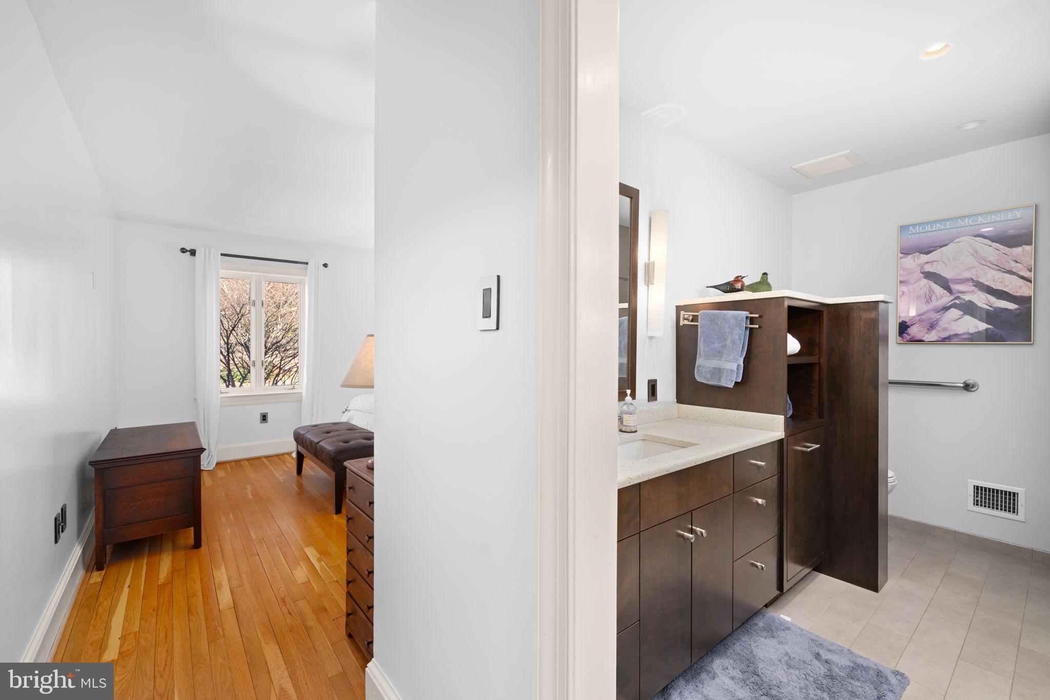 3988 Georgetown Court Northwest Washington, DC 20007 - Photo 22 of 38 a hallway with a view of living room