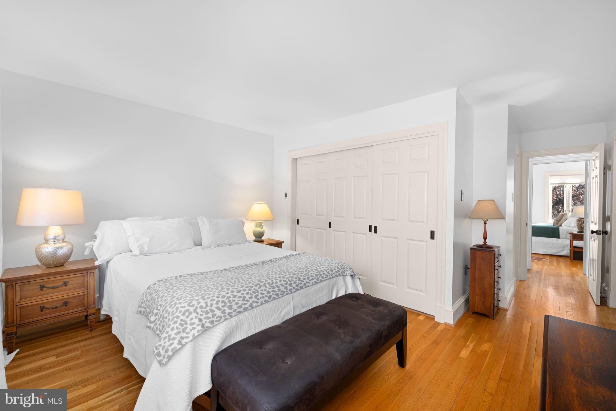 3988 Georgetown Court Northwest Washington, DC 20007 - Photo 24 of 38 a bedroom with a bed and wooden floor