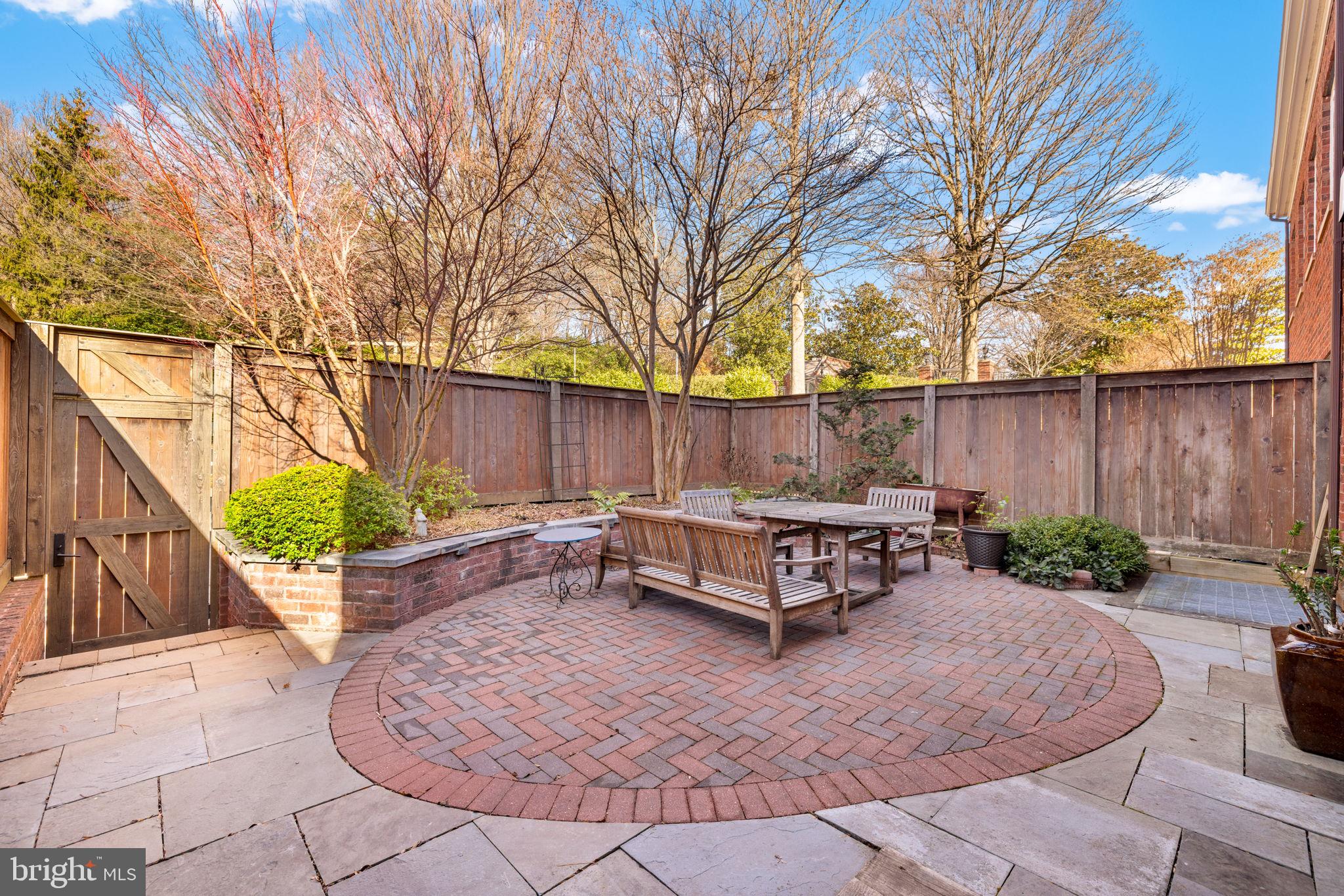 3988 Georgetown Court Northwest Washington, DC 20007 - Photo 35 of 38 a backyard of a house with outdoor seating