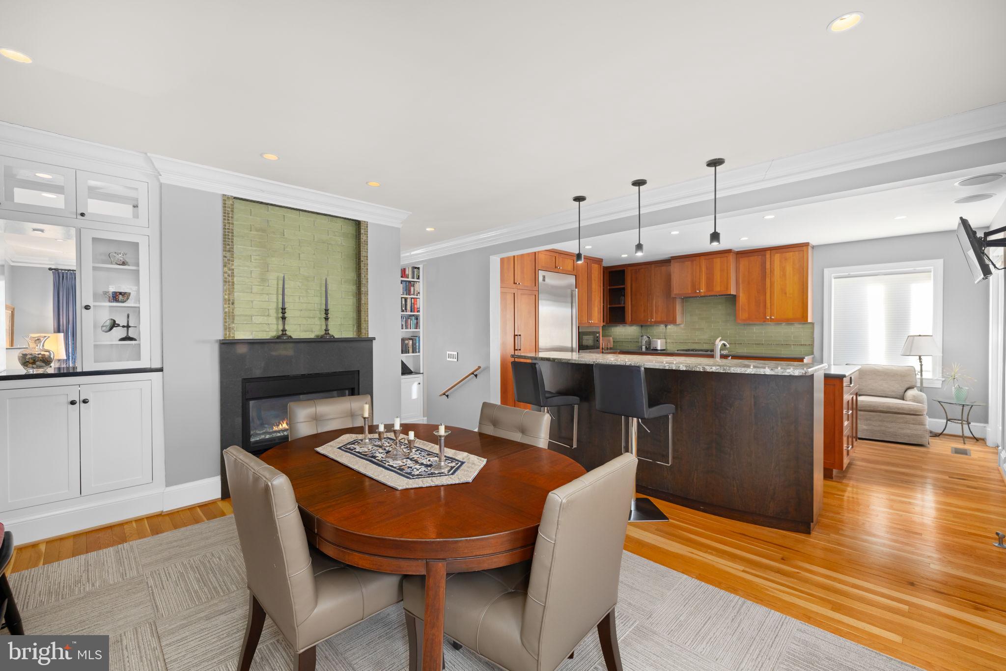 3988 Georgetown Court Northwest Washington, DC 20007 - Photo 10 of 38 a open kitchen with a table and chairs in it
