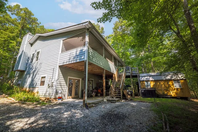 a view of a car park in front of a house