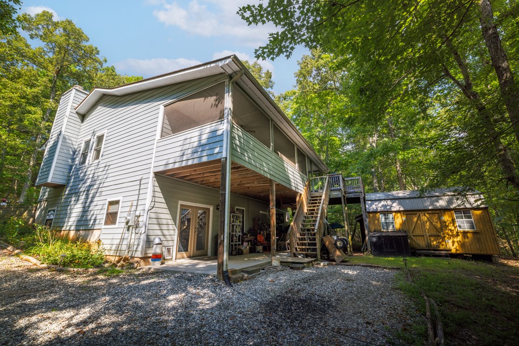 77 Chosen Ridge Morganton, GA 30560 - Photo 14 of 37 a view of a car park in front of a house