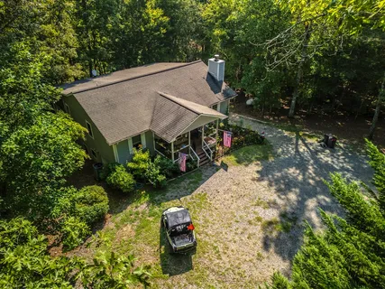 a view of backyard with green space